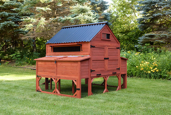 Large red wooden chicken coop with dual nesting boxes, corrugated metal roof, and integrated under-coop run.