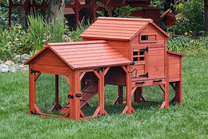 Leghorn Carousel Chicken Coop: Red elevated wooden house with dual pull-out cleaning trays, tiered roof, and integrated run.