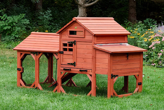 Leghorn Carousel Chicken Coop: Red wooden elevated house with attached run, dual pull-out cleaning trays, and tiered roof.