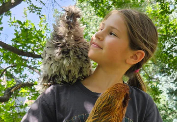 Girl with chicken